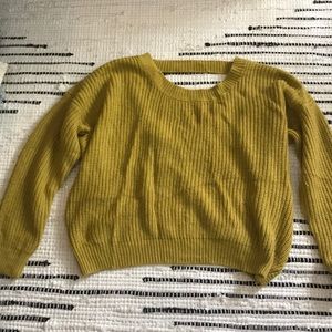 mustard open, twist back sweater